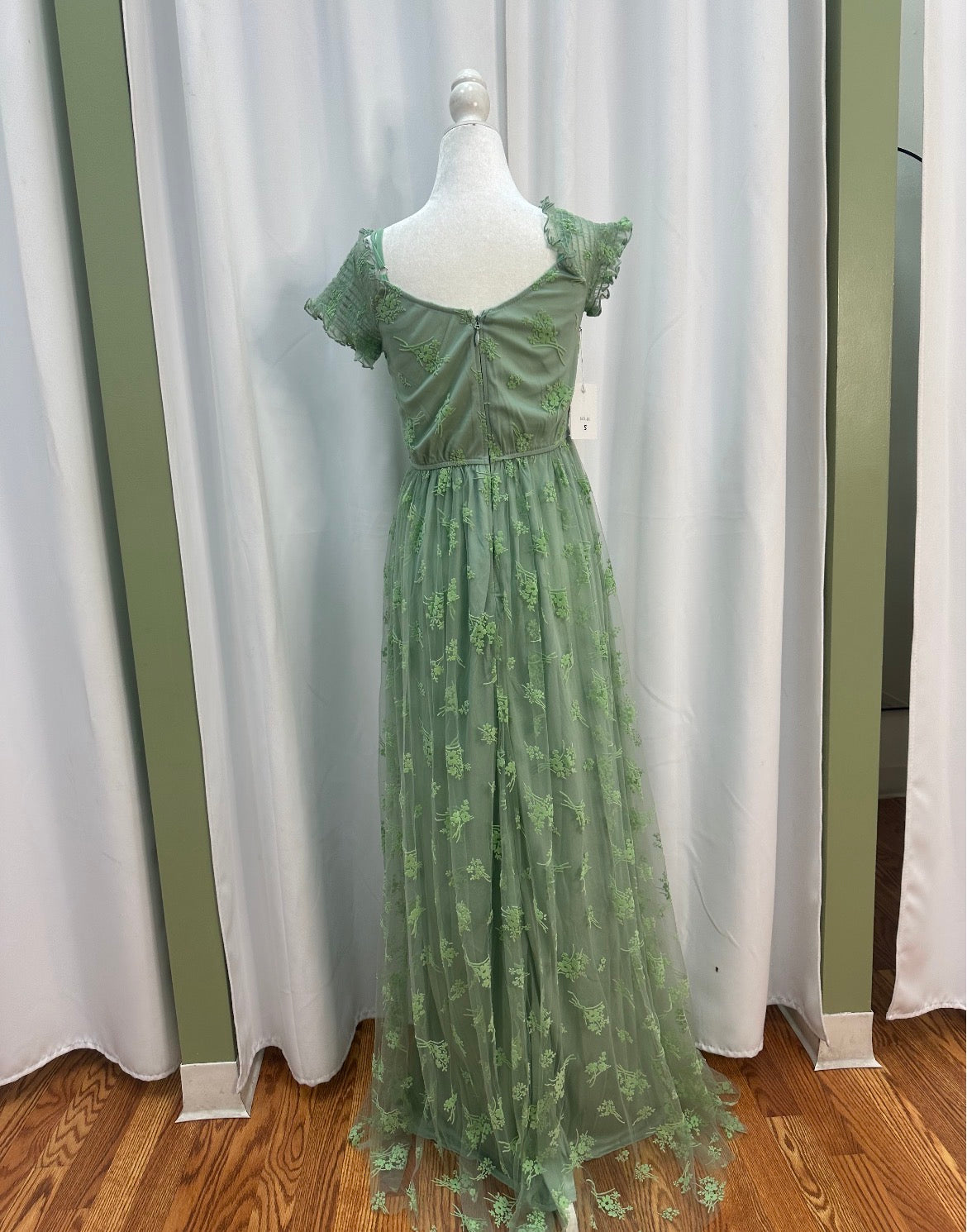 Sage Green, modern style dress, off shoulder sleeves.