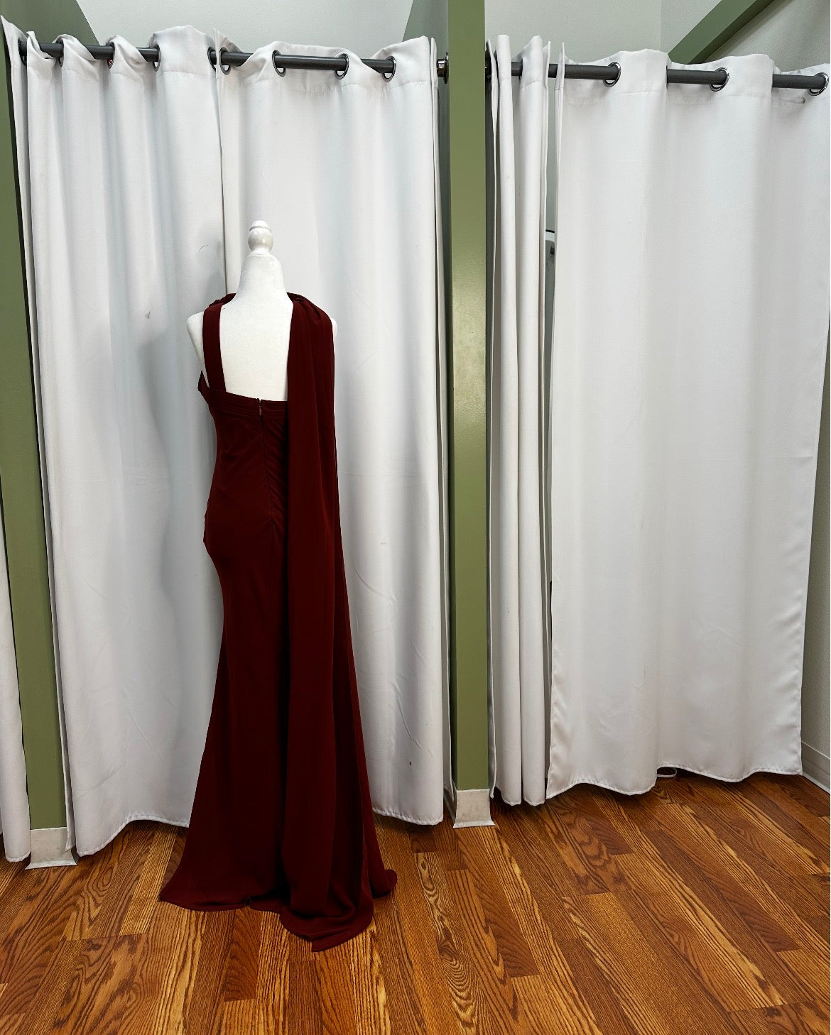 Polyester Dark Rust, scarfed neck design, with beautiful front detail.