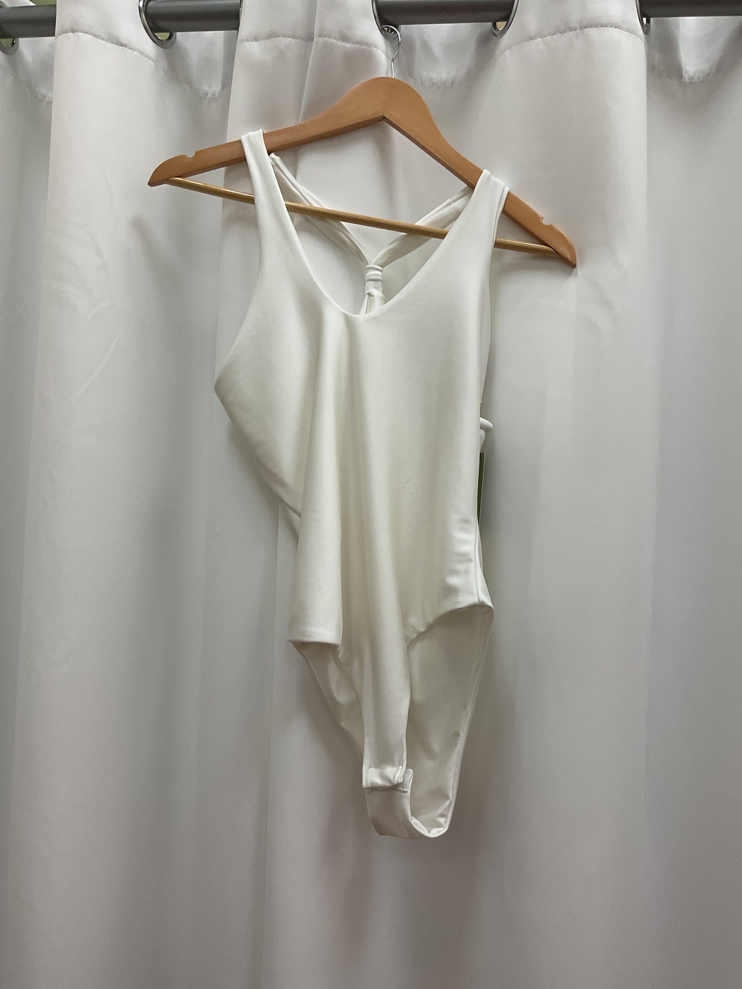 White bodysuit cross