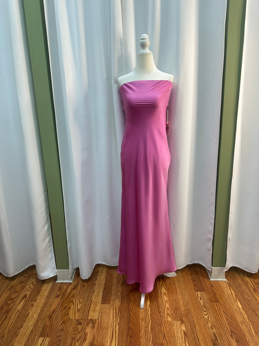 long pink satin dress with bow on the back