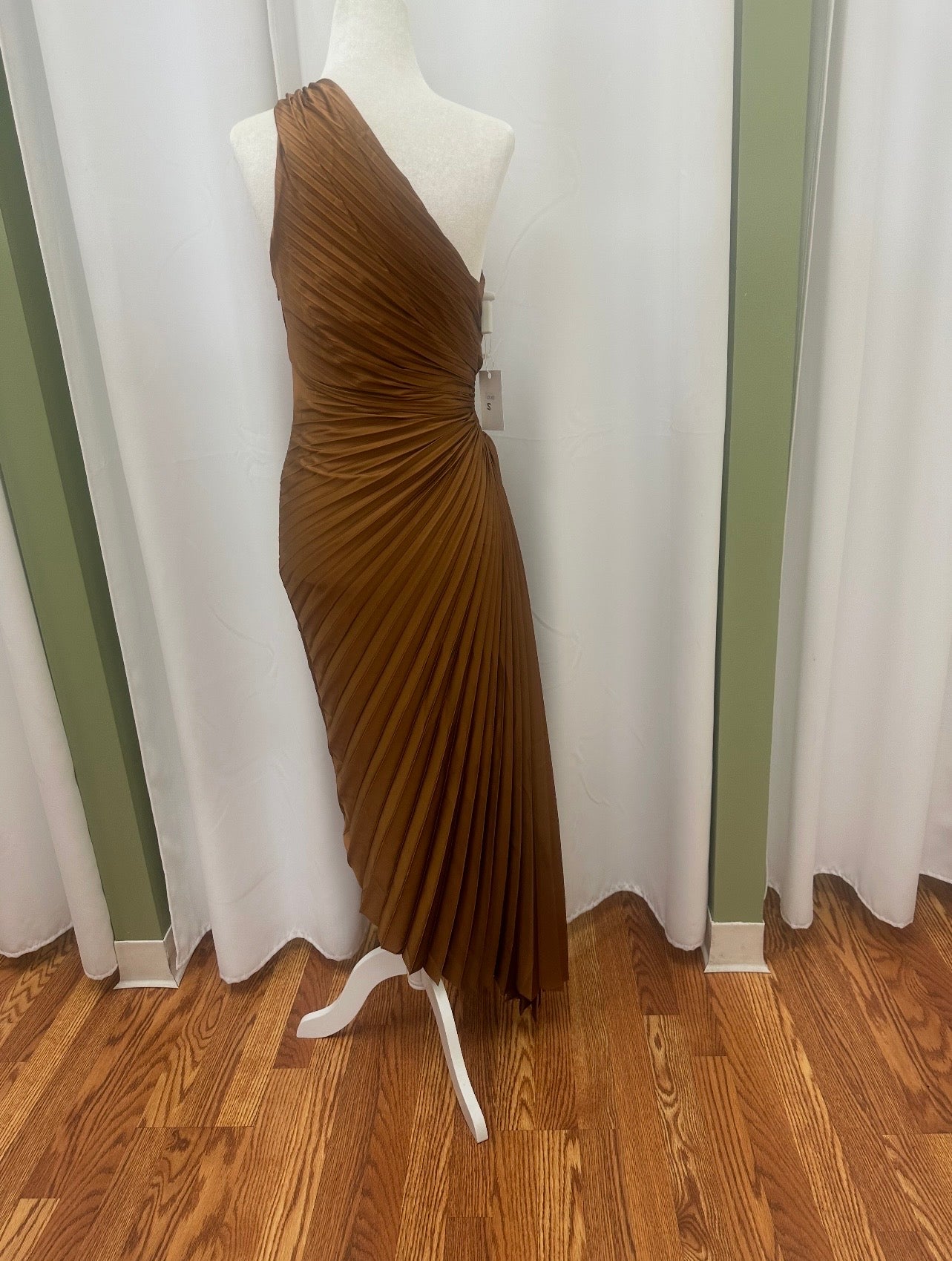 long golden pleaded dress