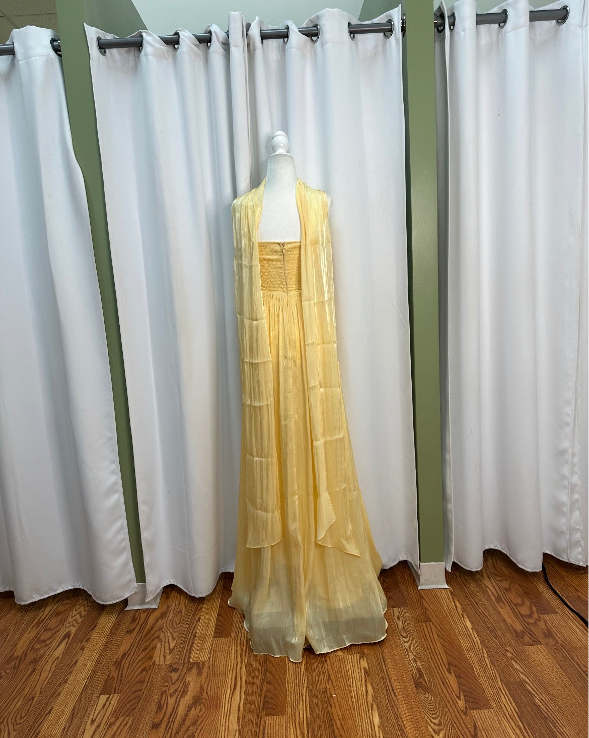 chiffon yellow long scarf neck dress aligned with halter straps back design.