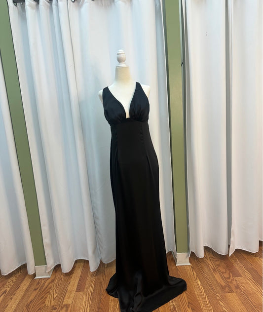 Satin black dress, open back design.