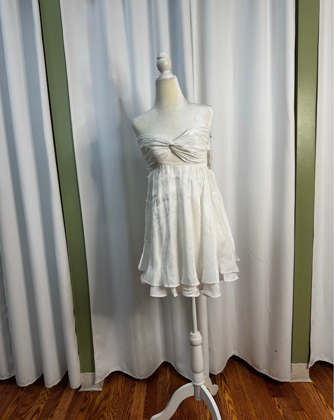 white short layered dress, bow design upfront open back.