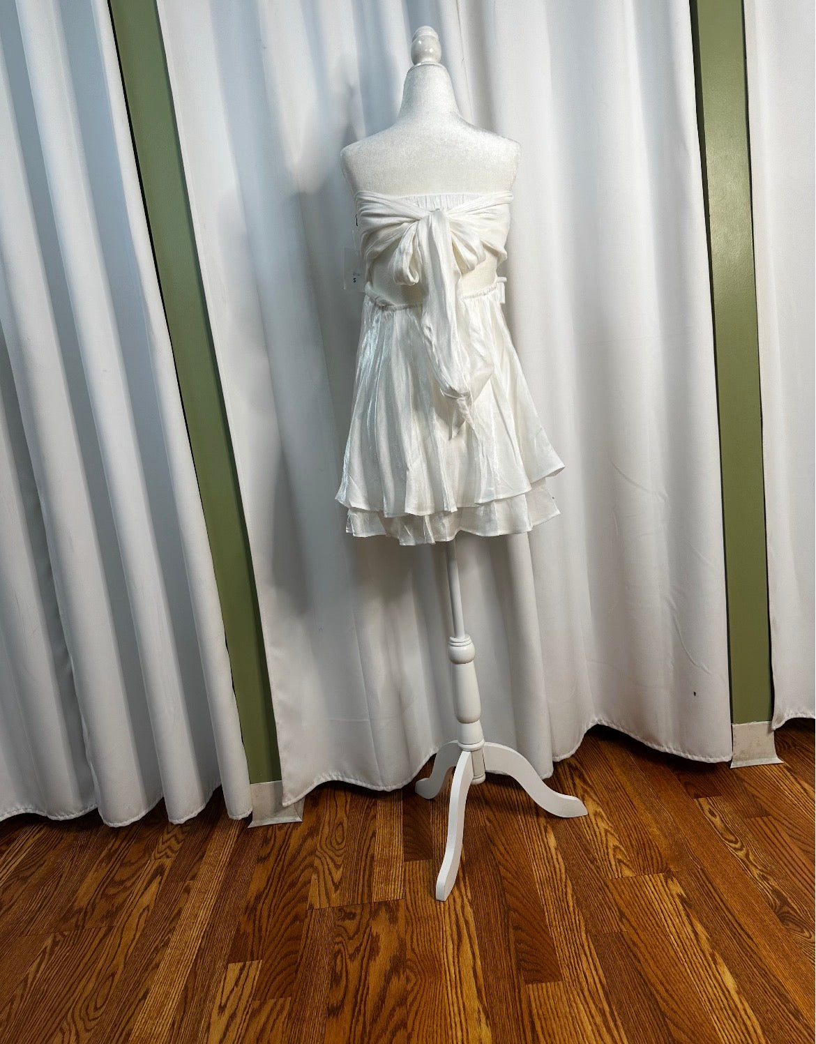 white short layered dress, bow design upfront open back.