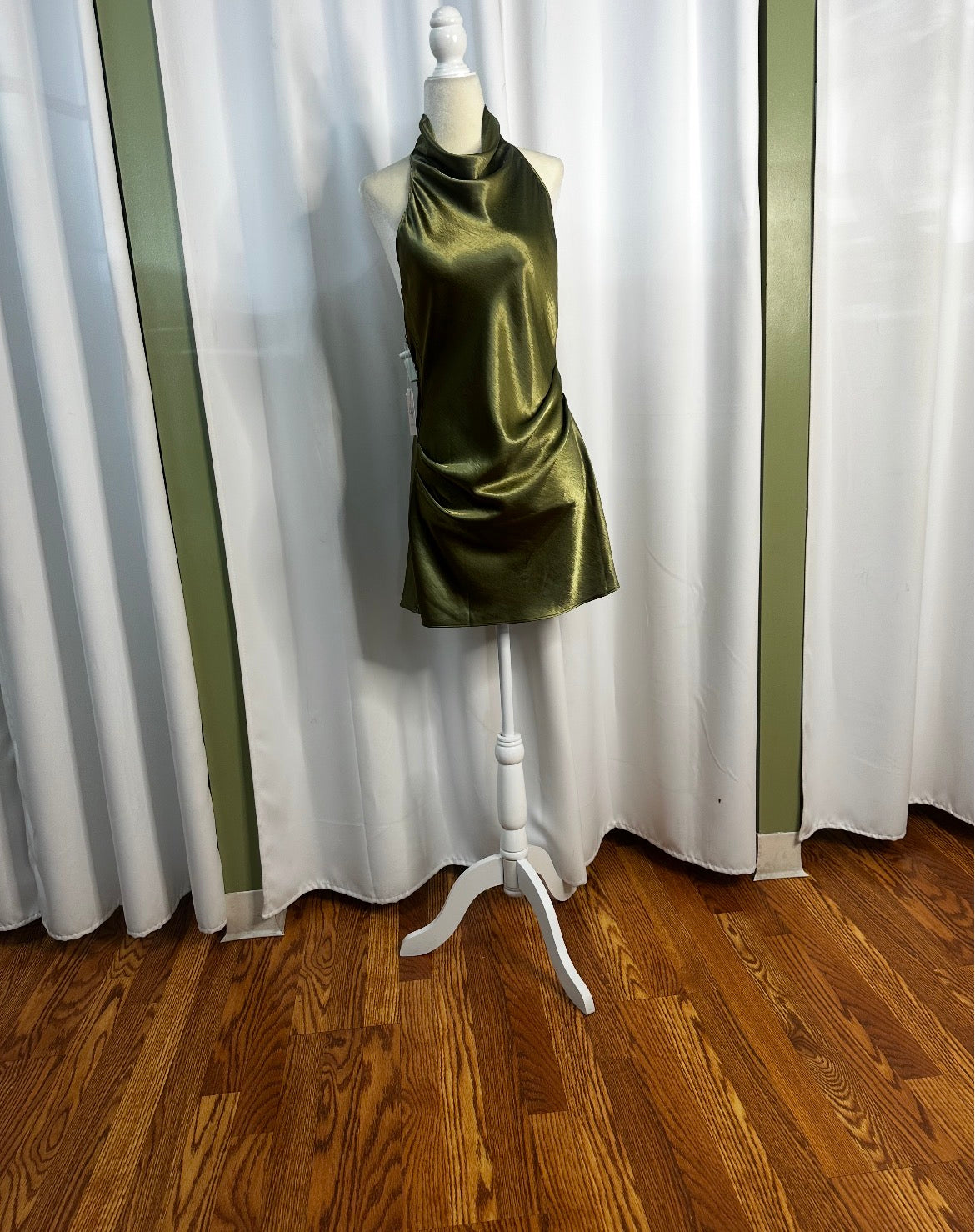 Green satin short turtleneck dress open back.