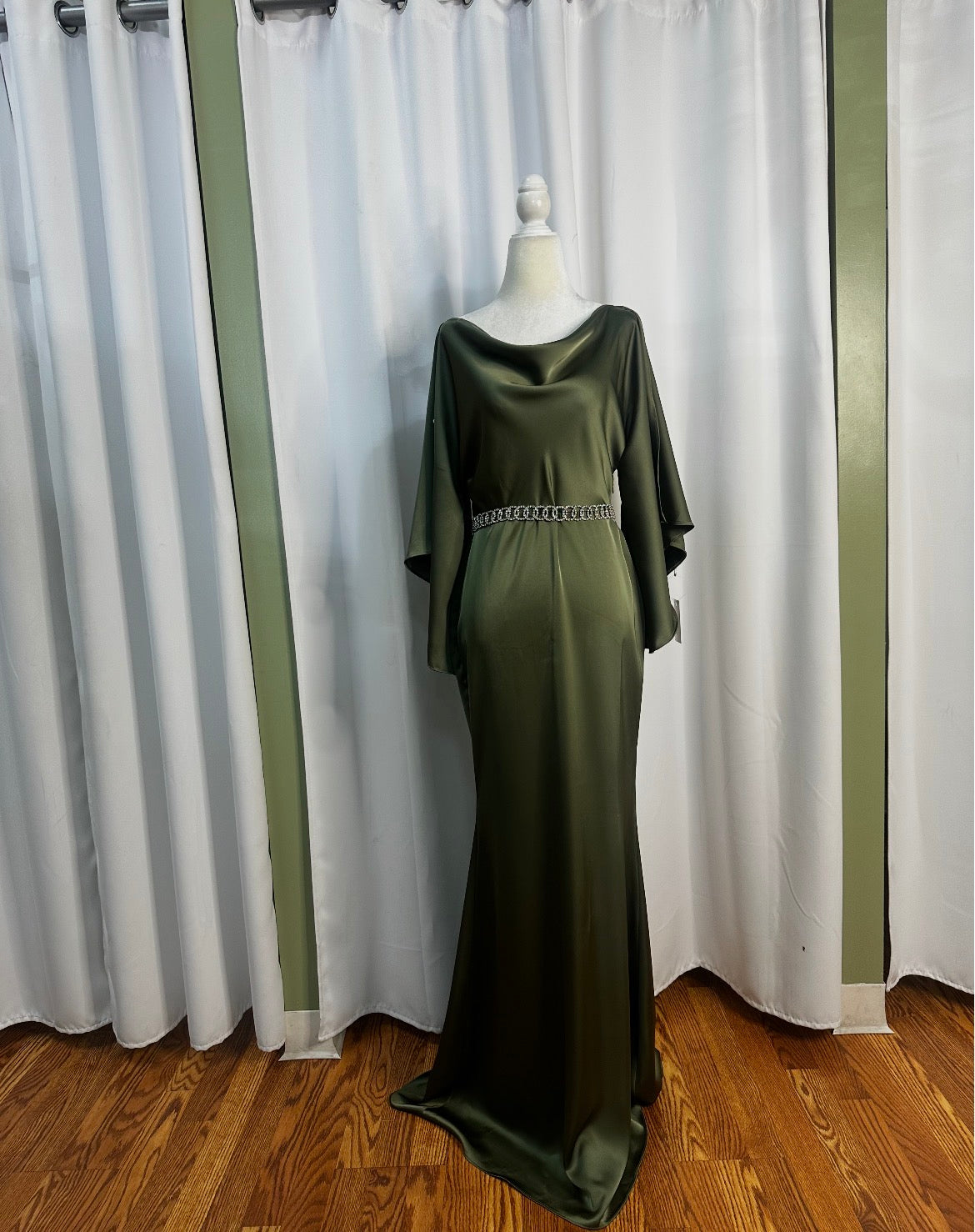 Olive green satin long dress with long sleeves.