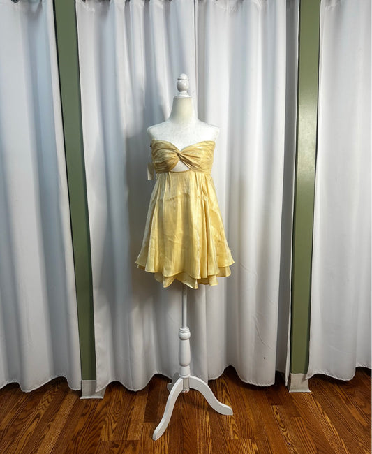 yellow short layered dress, bow design upfront, openback.