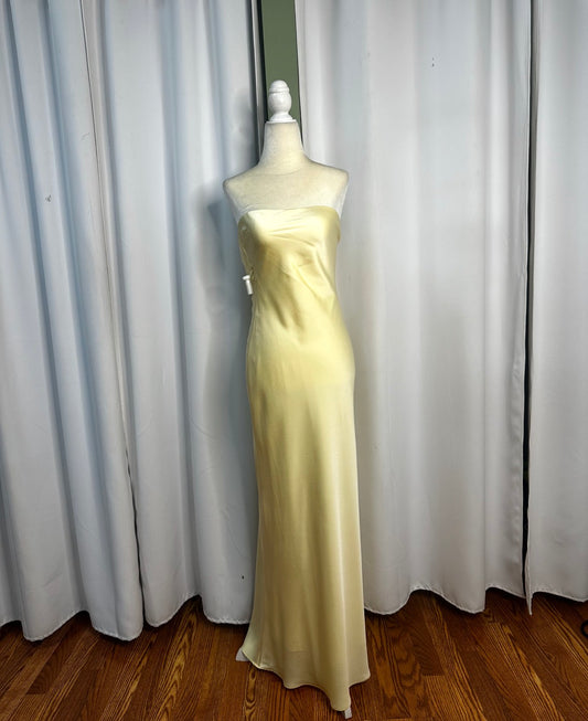 yellow satin, strapless bow tied back long elegant beautiful dress.