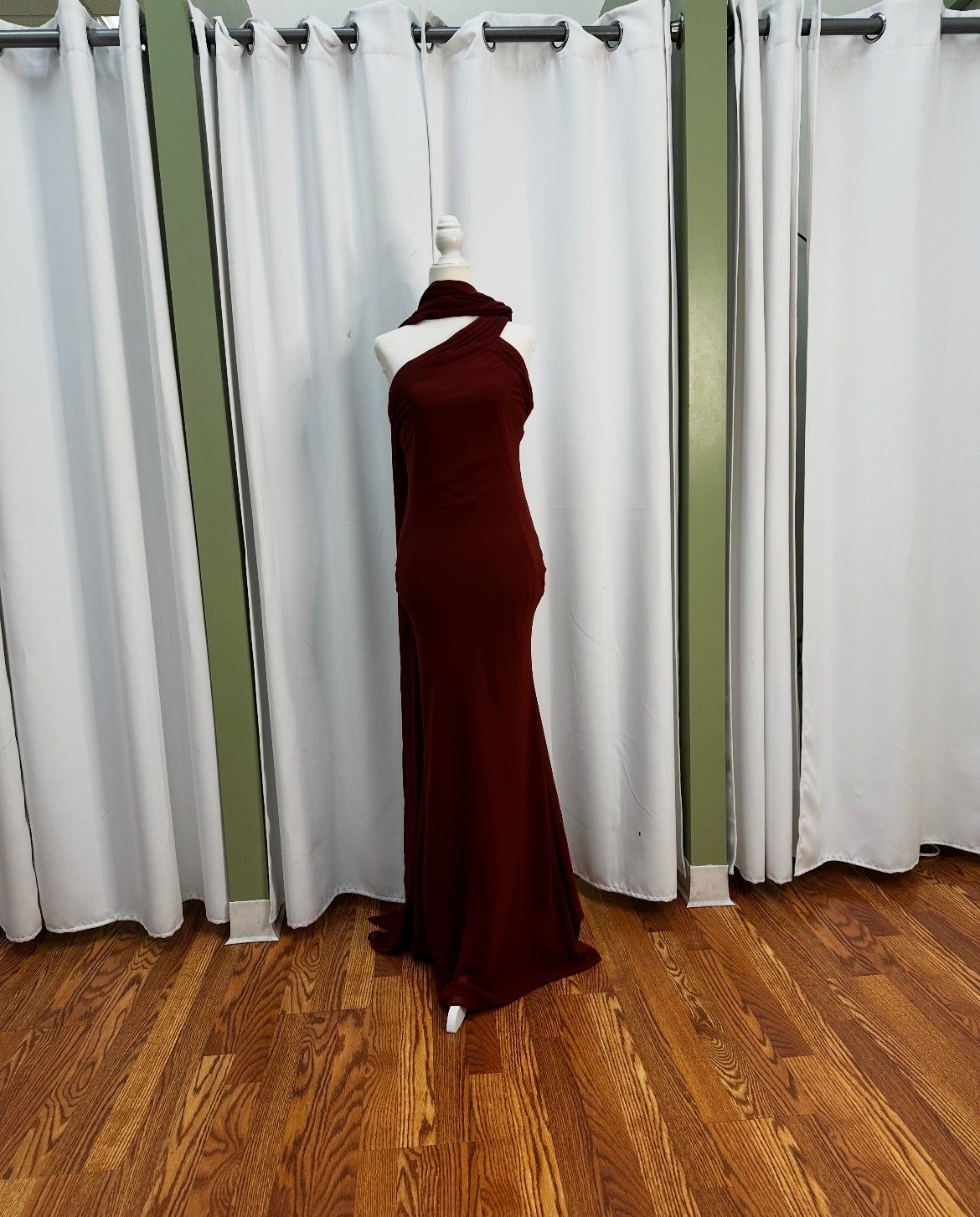 Polyester Dark Rust, scarfed neck design, with beautiful front detail.